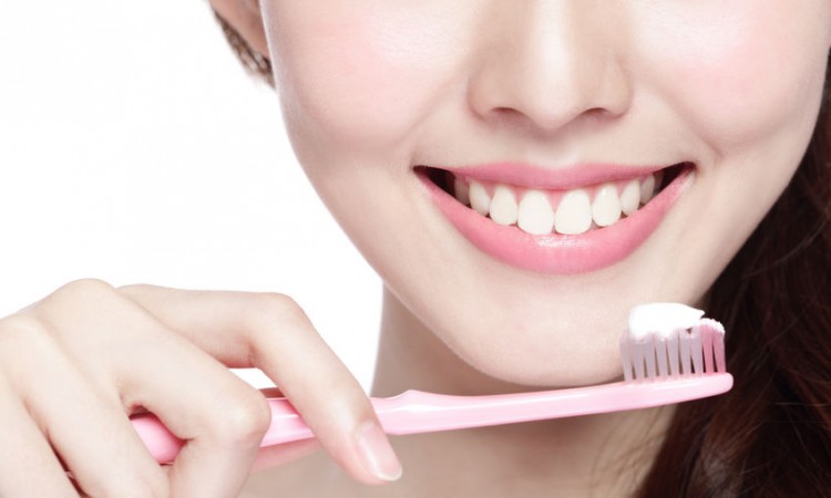 38923613 - close up of smile woman brush teeth. great for health dental care concept, isolated over white background. asian